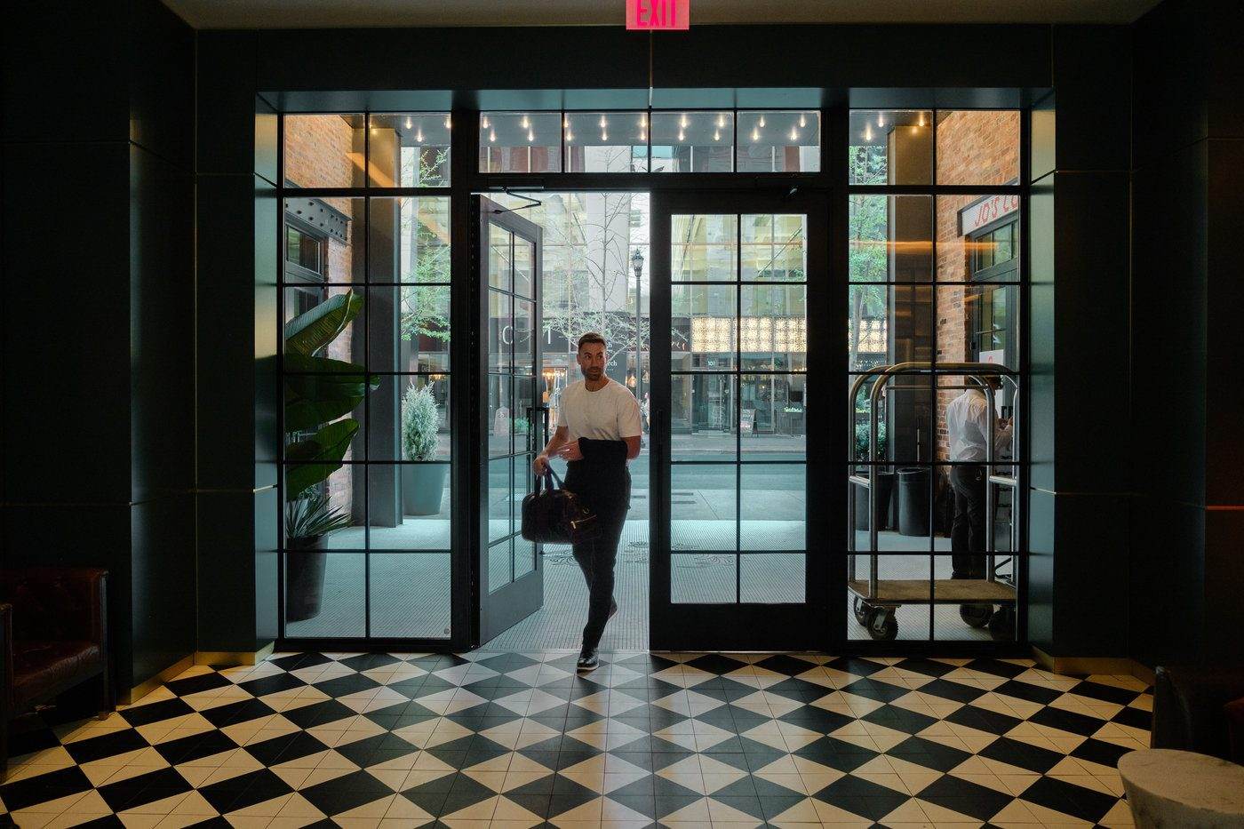 Guest walking through the Dream Nashville lobby