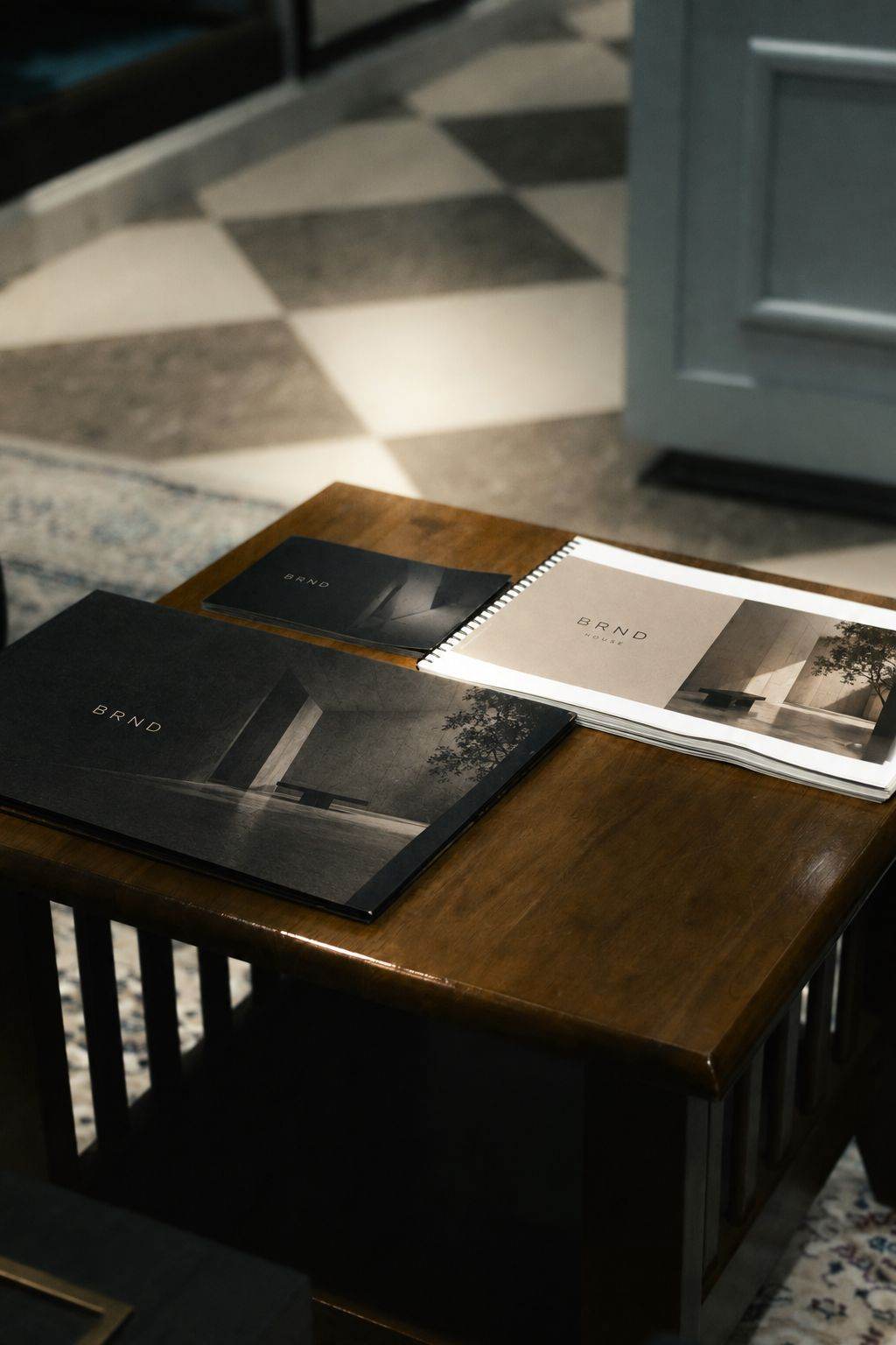 Styled brand materials on a dark wood table
