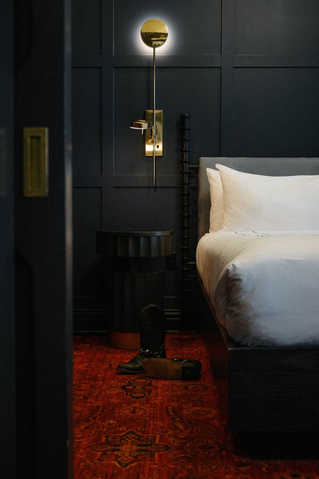Dark-paneled guest room