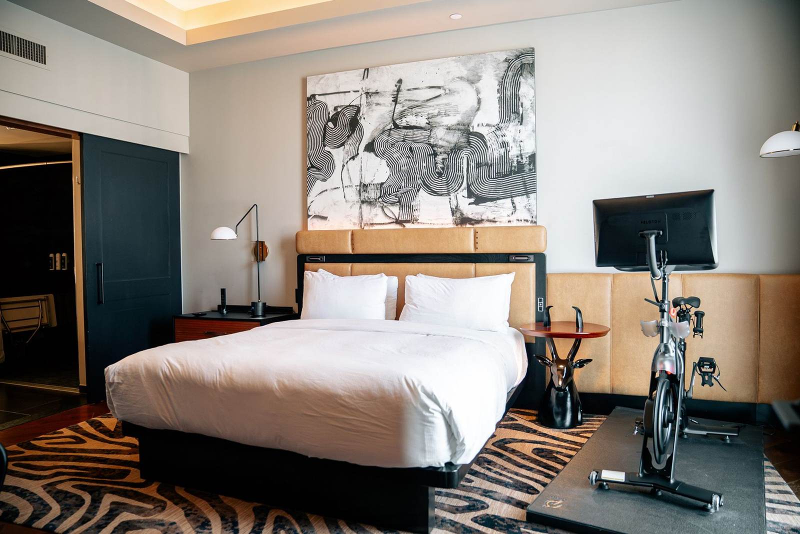 Guest room with a bold mural